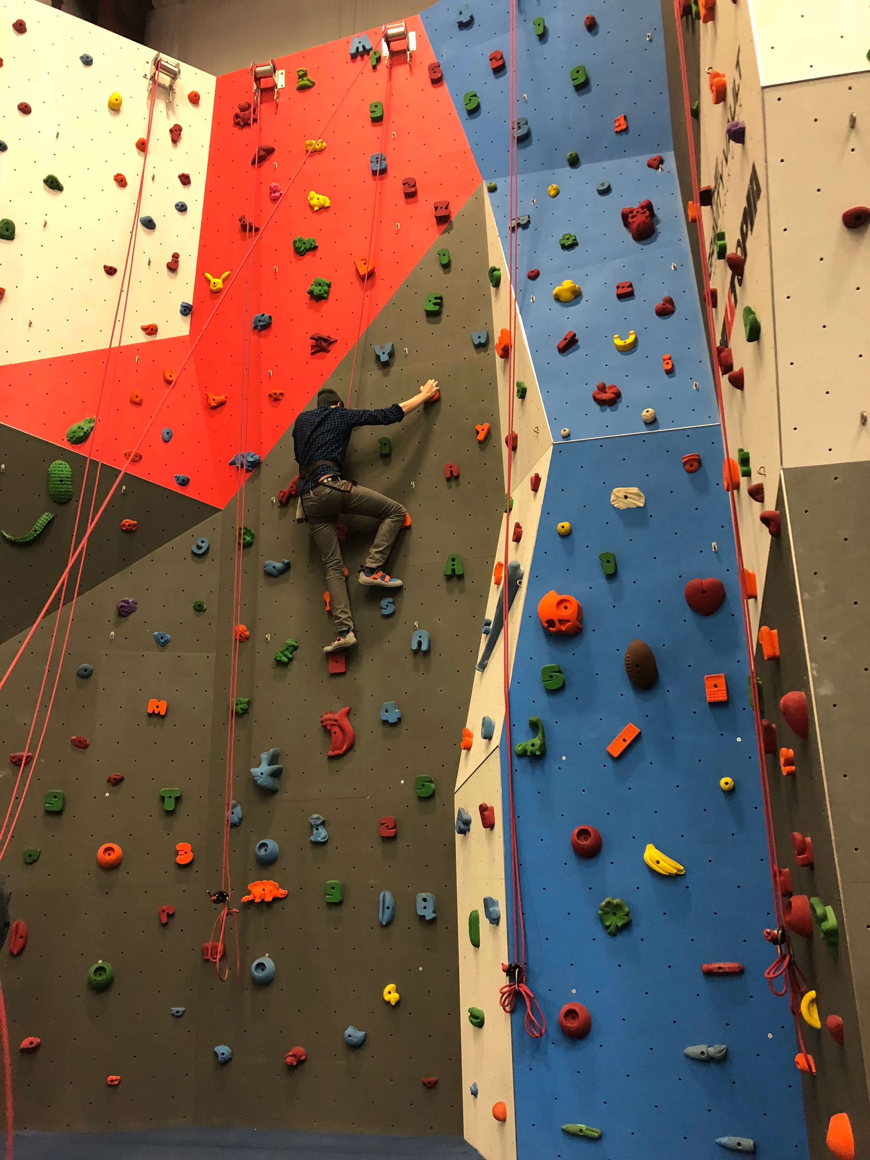 dad climbing at gravity vault in dutchess county